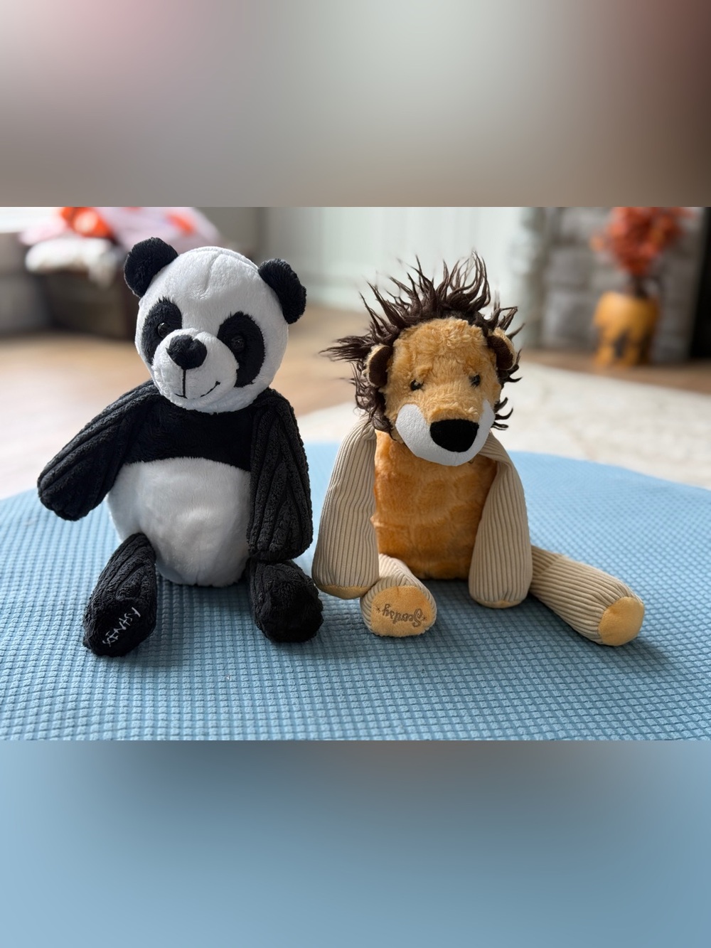 Scentsy Plush Stuffed Animal Panda and Lion Toy scent holders.